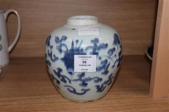 A 17th century Chinese blue and white ovoid jar, unglazed base height 17.5cm, lacking cover